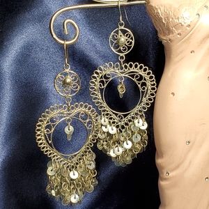 Heart shaped silver toned dangle earrings